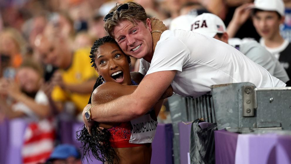 PHOTO: Tara Davis-Woodhall of Team United States celebrates winning the gold medal after competing in the Women's Long Jump Final on day thirteen of the Olympic Games Paris 2024 at Stade de France on Aug. 8, 2024 in Paris.