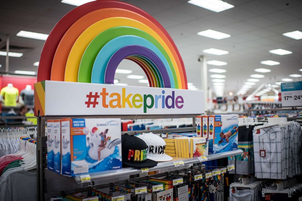 PHOTO: Signage for Target Corp.'s "#TakePride" initiative sits above products displayed for sale at a company store, May 16, 2016, in Chicago.