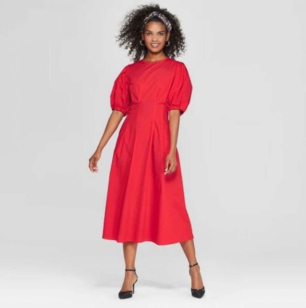 PHOTO: This fall, bold color rules. We love how the saturated shade of this dress make a statement (no need to bother with fussy patterns). Wear it with paired down accessories and comfortable shoes to play up its minimalist appeal.