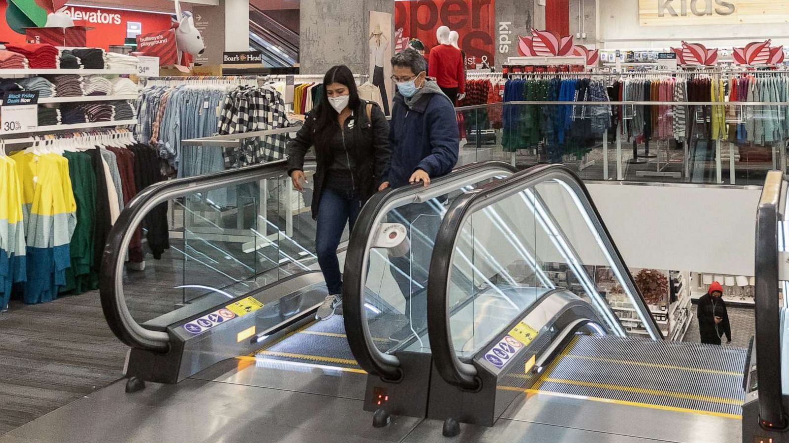 PHOTO: Customers wearing protective masks shop at Target store during Black Friday on Nov. 27, 2020, in New York.