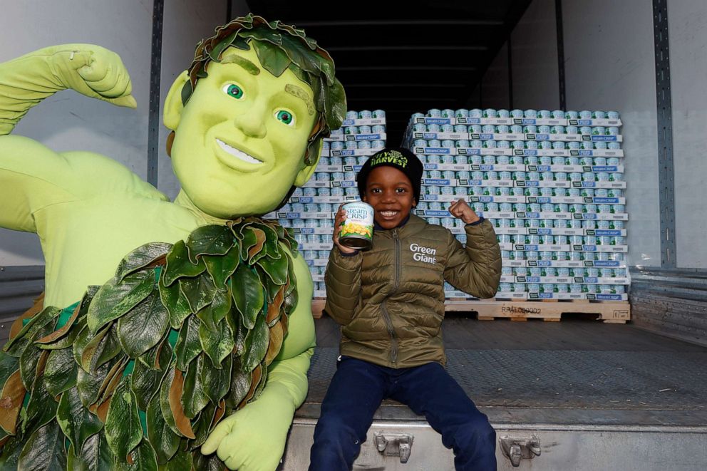 PHOTO: Green Giant partners with Tariq the "Corn Kid" to donate 90,000 cans of vegetables to City Harvest in celebration of Thanksgiving, on Nov. 21, 2022, in New York.