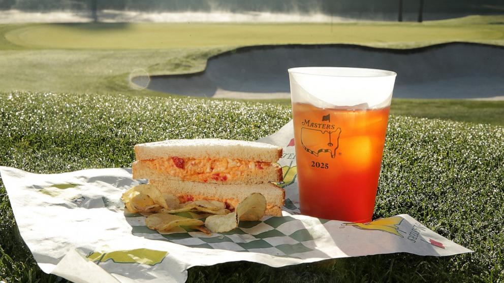 PHOTO: A pimento cheese sandwich with chips on the grass at Augusta National Golf Club.