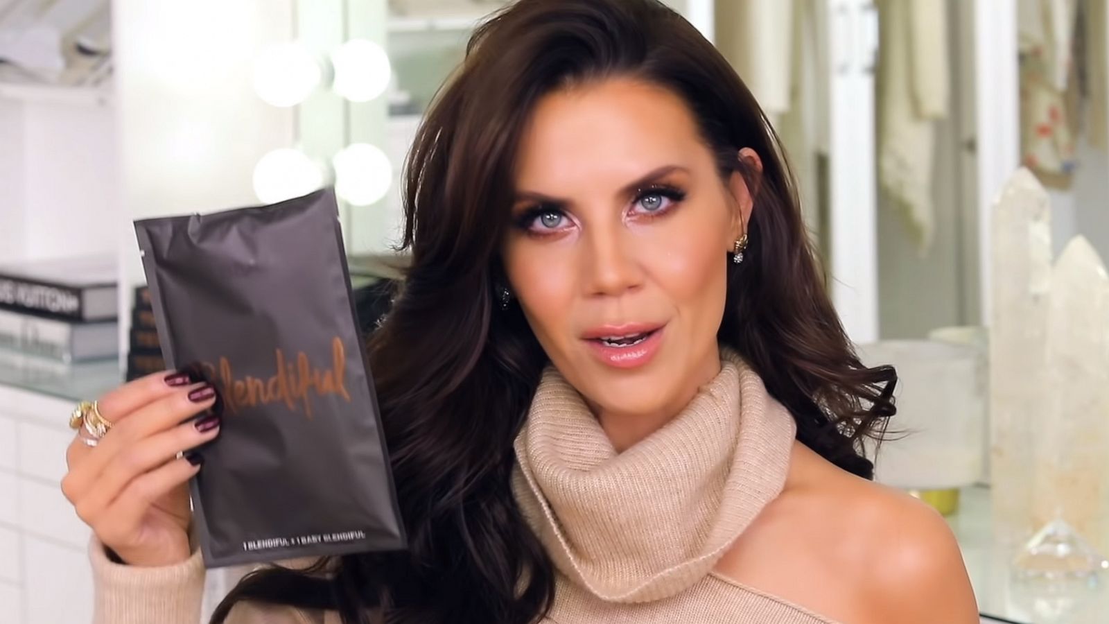 PHOTO: Beauty blogger Tati Westbrook holds up the packaging for the Tati Beauty Blendiful tool in a video posted to her YouTube account on Jan. 9, 2020.