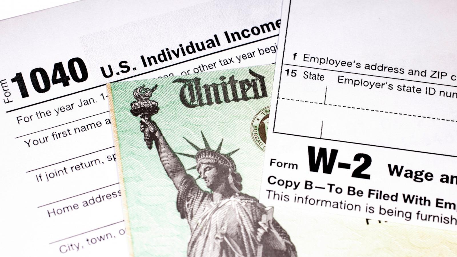 PHOTO: Stock photo of a W-2 tax return and check.