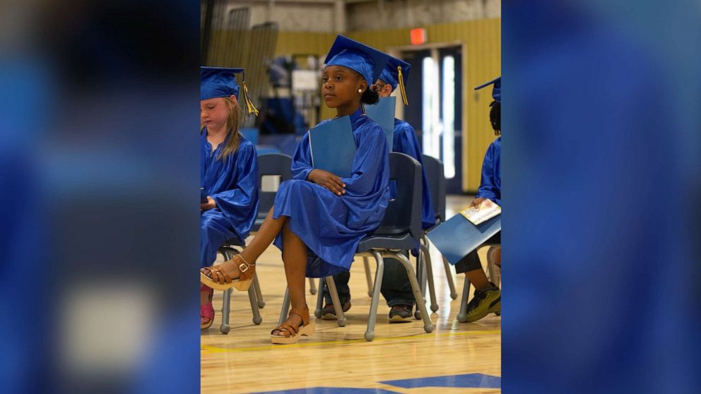 PHOTO: A photo of DeLexus Sims' daughter Taylor, looking confident and poised at her kindergarten graduation, has gone viral.