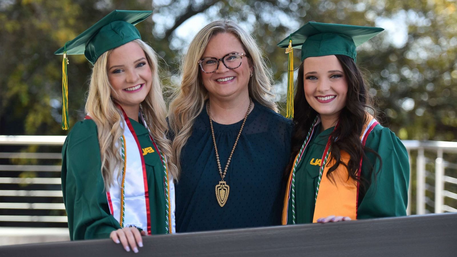 PHOTO: Tara Wood (center) with her twin daughters, Taylor England and Jade England, who both graduated from the University of Alabama at Birmingham this spring.