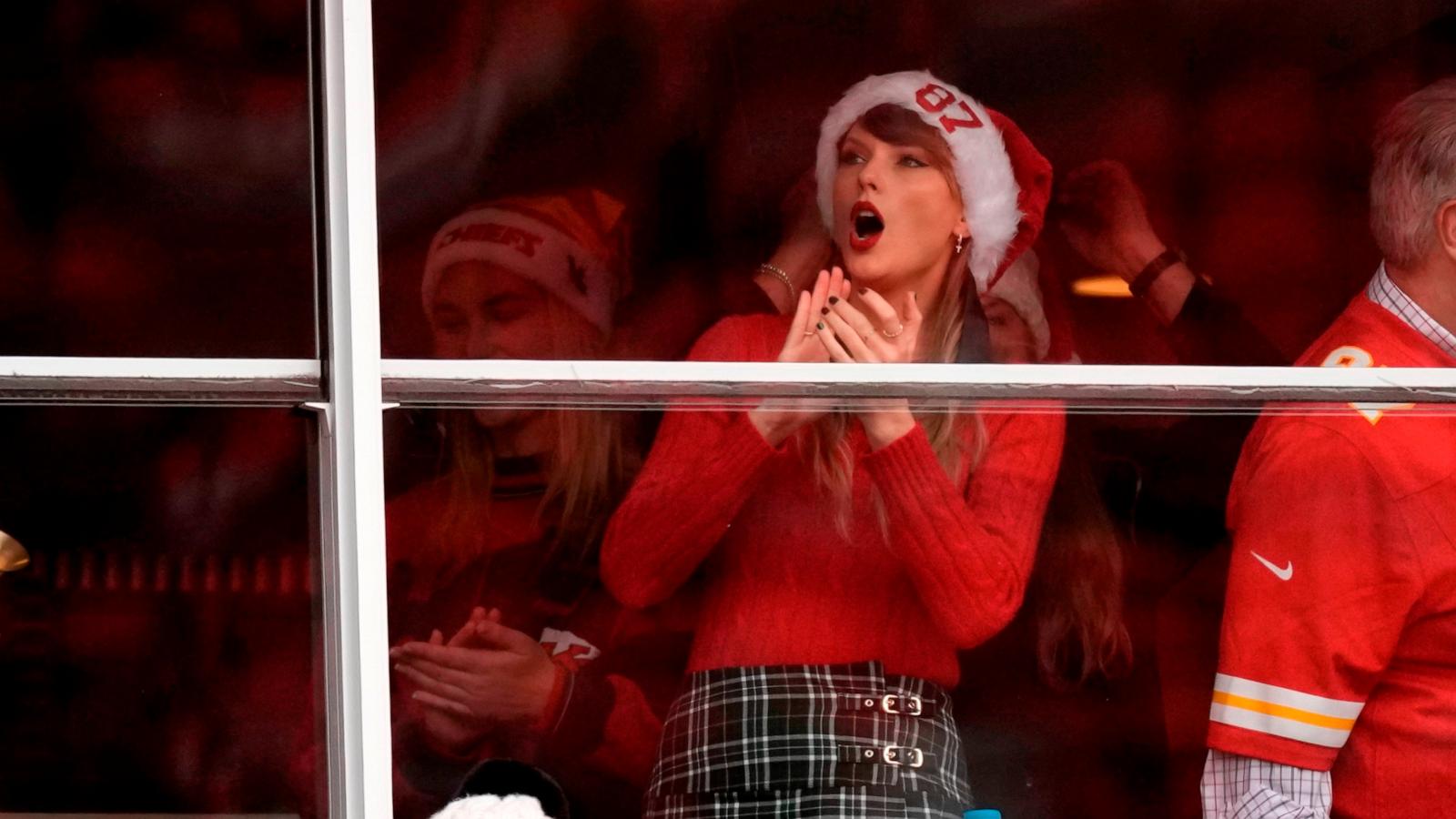 PHOTO: Taylor Swift is seen in a suite before the start of an NFL football game between the Kansas City Chiefs and the Las Vegas Raiders, Dec. 25, 2023, in Kansas City, Mo.