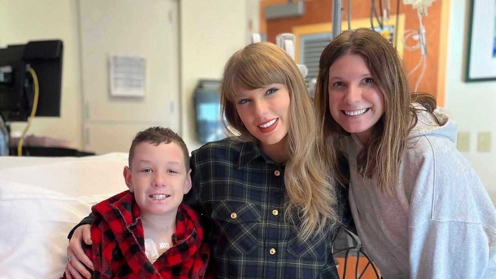 PHOTO: In this image provided by Cassie Thomas, Beckett Thomas, 13, who is a patient at Children's Mercy Hospital in Kansas City, Mo., and his mother Cassie Thomas, right, pose with Taylor Swift, on Dec. 12, 2024.