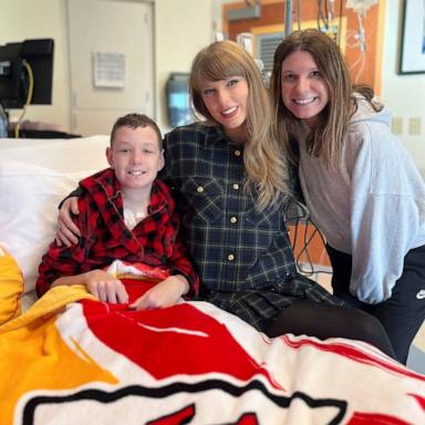 PHOTO: In this image provided by Cassie Thomas, Beckett Thomas, 13,  who is a patient at Children's Mercy Hospital in Kansas City, Mo., and his mother Cassie Thomas, right, pose with Taylor Swift, on Dec. 12, 2024. 