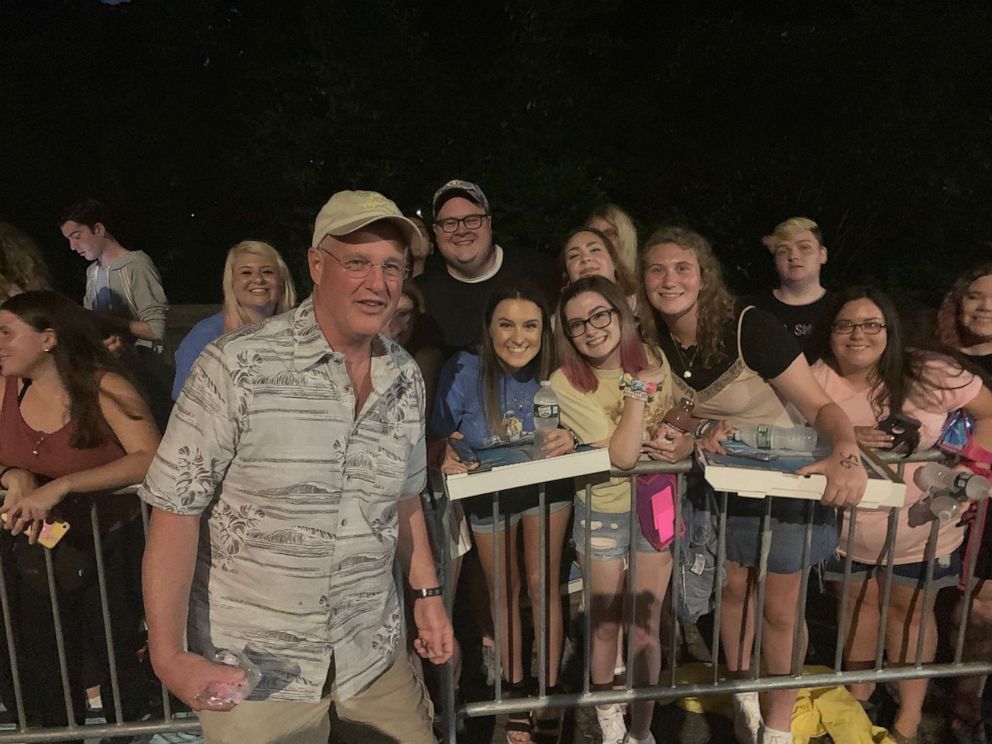 PHOTO: Taylor Swift's dad, Scott, handed out pizzas and posed with fans the night before her concert in Central Park on Thursday, Aug. 22, 2019.