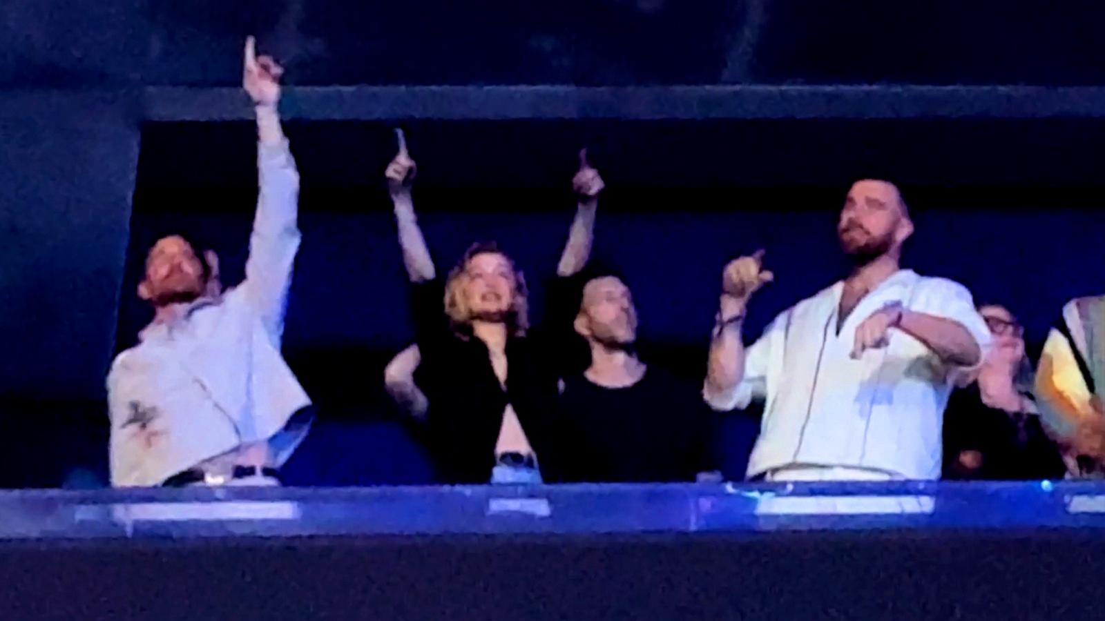 PHOTO: Travis Kelce, Gigi Hadid and Bradley Cooper attend the Taylor Swift concert in Paris, May 12, 2024.