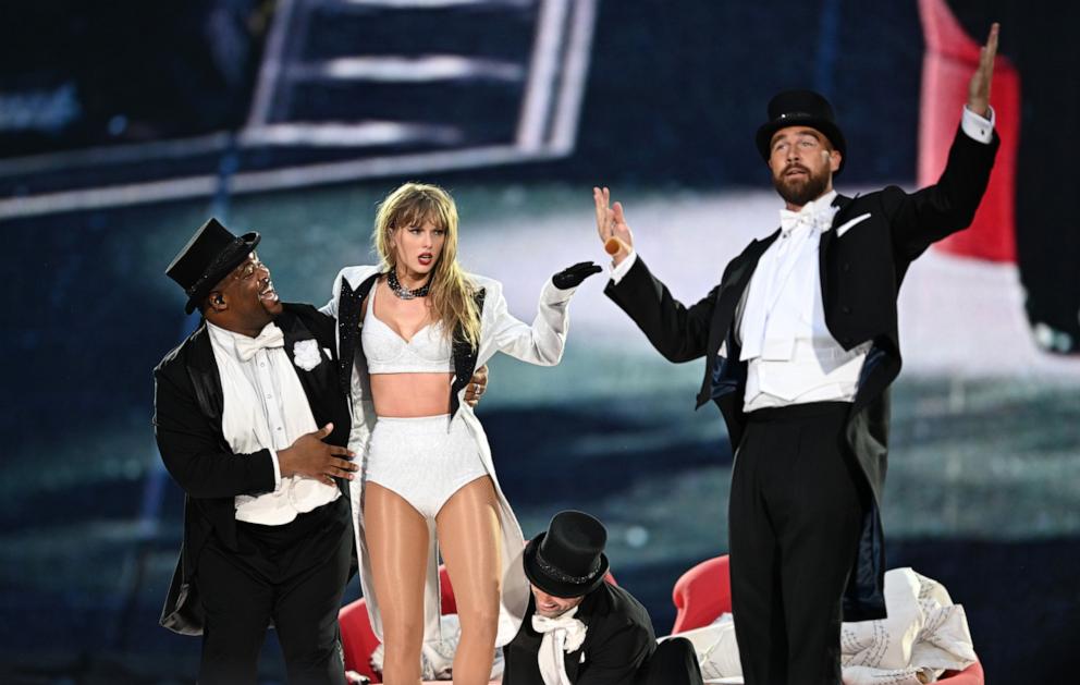 PHOTO: Taylor Swift is joined on stage by Travis Kelce (R), during "Taylor Swift | The Eras Tour" at Wembley Stadium on June 23, 2024 in London.