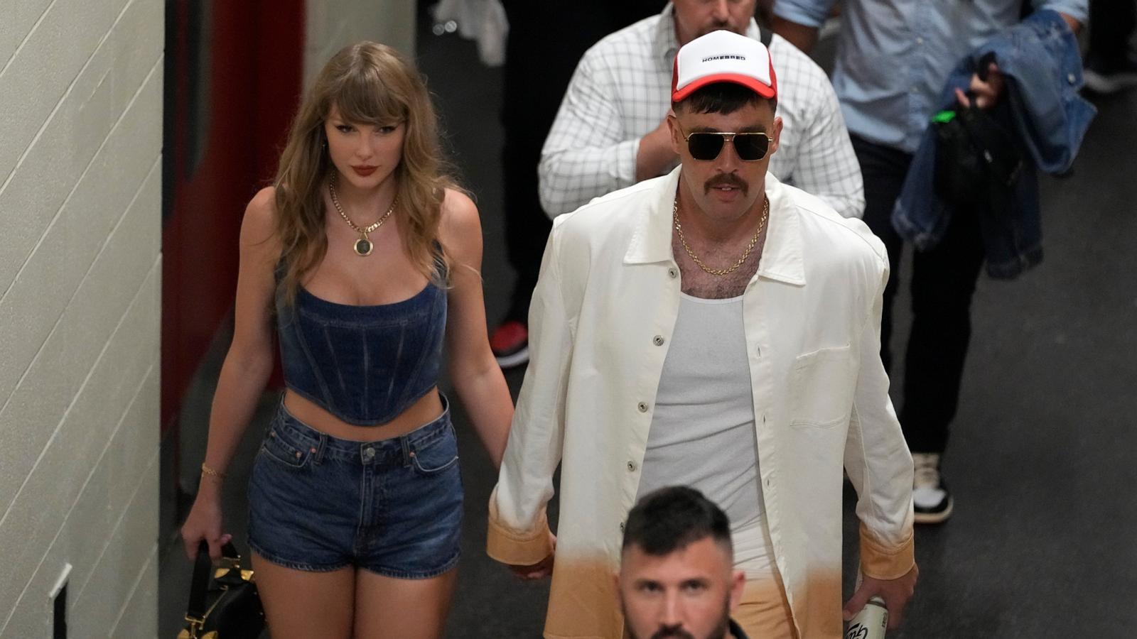 PHOTO: Taylor Swift and Kansas City Chiefs tight end Travis Kelce hold hands following an NFL football game between the Chiefs and the Baltimore Ravens, Sept. 5, 2024, in Kansas City, Mo.