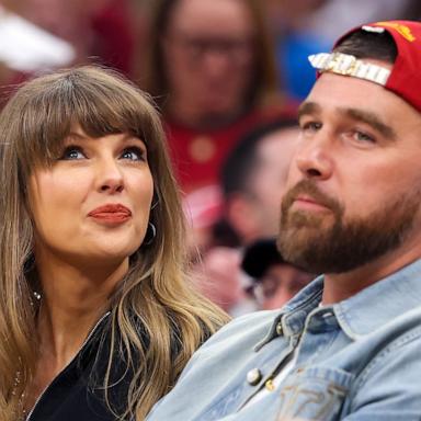 [PHOTO: Taylor Swift and Travis Kelce attend Game Three between the New York Knicks and the Cleveland Cavaliers in the NBA Eastern Conference Finals at Rocket Arena on May 23, 2026 in Cleveland, Ohio.]