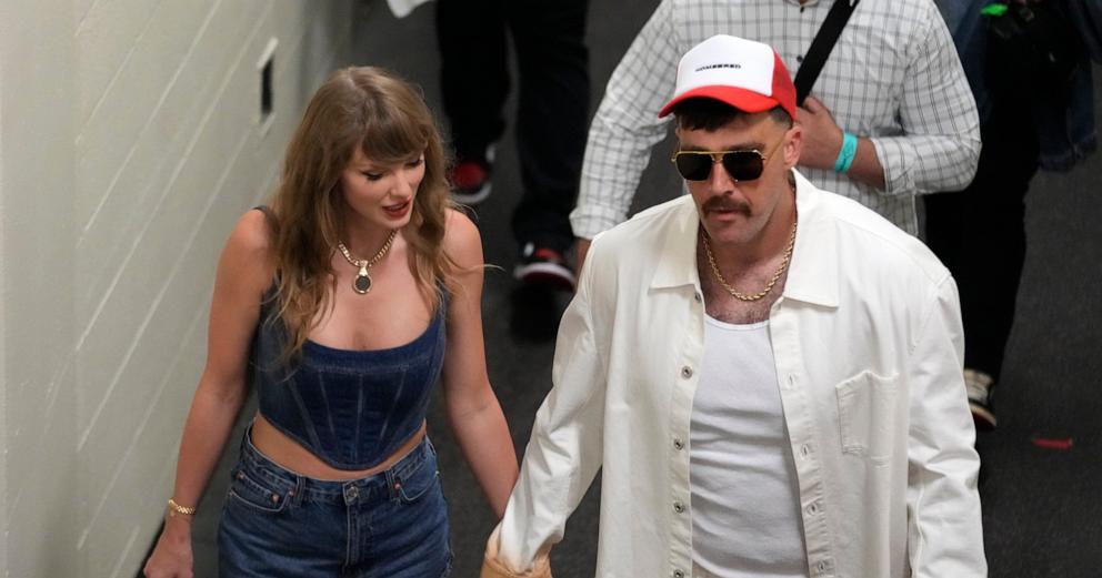 PHOTO: Taylor Swift and Kansas City Chiefs tight end Travis Kelce hold hands following an NFL football game between the Chiefs and the Baltimore Ravens, Sept. 5, 2024, in Kansas City, Mo.