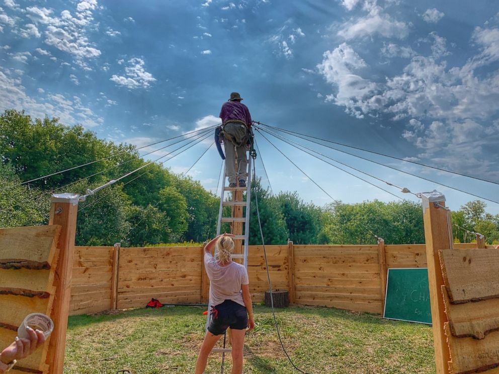 PHOTO: With help from her family, Lindsey Earle, of Prairie Hill Waldorf School in Pewaukee, Wisconsin, built an outdoor structure for the 13 students in her class amid the novel coronavirus pandemic.