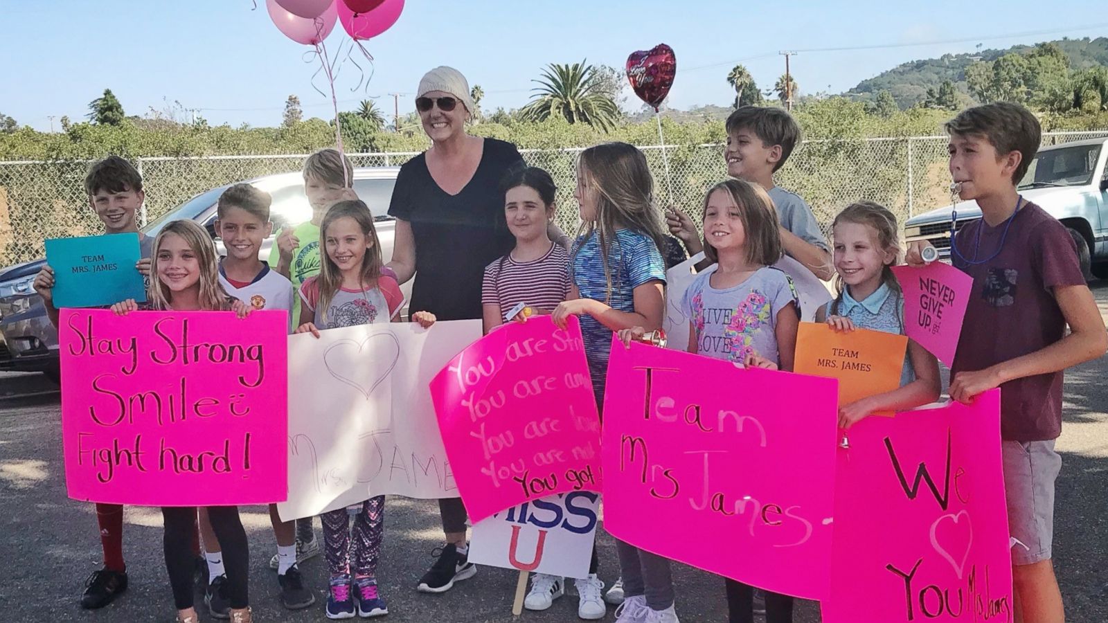 PHOTO: Katherine James was surprised by a mob of students at her home on the last day she underwent chemotherapy.