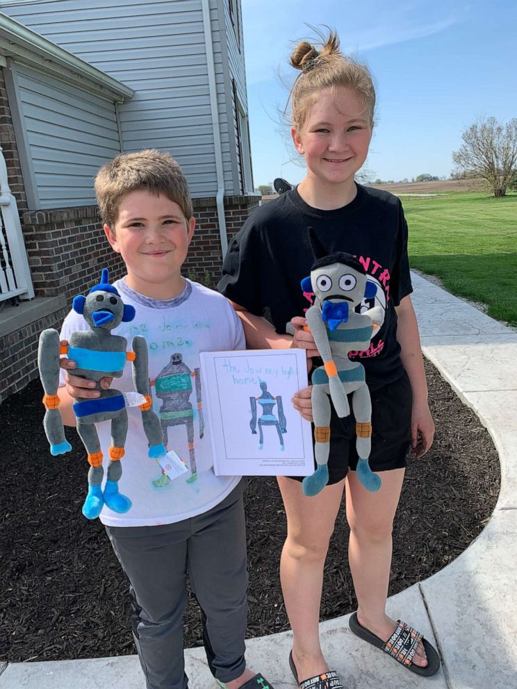 PHOTO: For his project, Joshua Johns, 9, decided to to write a sequel to his 11-year-old sister Crysta's book, which was about a robot. 