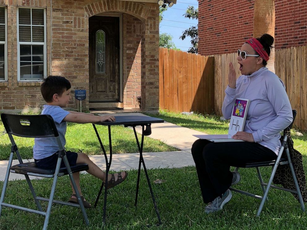 PHOTO: Myra Garza, a preschool teacher at Holy Spirit Catholic School in San Antonio, Texas, took her classroom to students' driveways during the coronavirus pandemic.