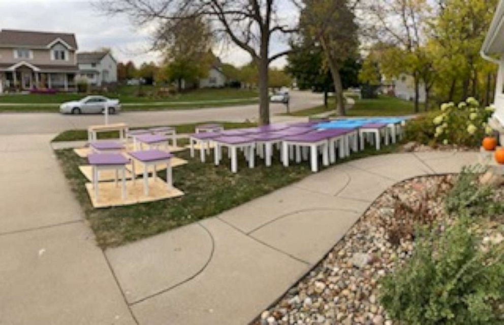 PHOTO: Nate Evans, a 7th grade literacy teacher from Ankeny, launched the project he calls Woodworking with a Purpose. He and 50-plus volunteers have built roughly 600 desks for kids. Each desk cost $20-$25 to make.