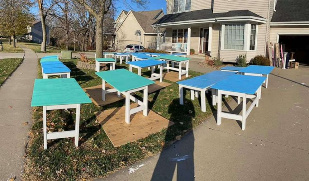 PHOTO: Nate Evans, a 7th grade literacy teacher from Ankeny, launched the project he calls Woodworking with a Purpose. He and 50-plus volunteers have built roughly 600 desks for kids. Each desk cost $20-$25 to make.