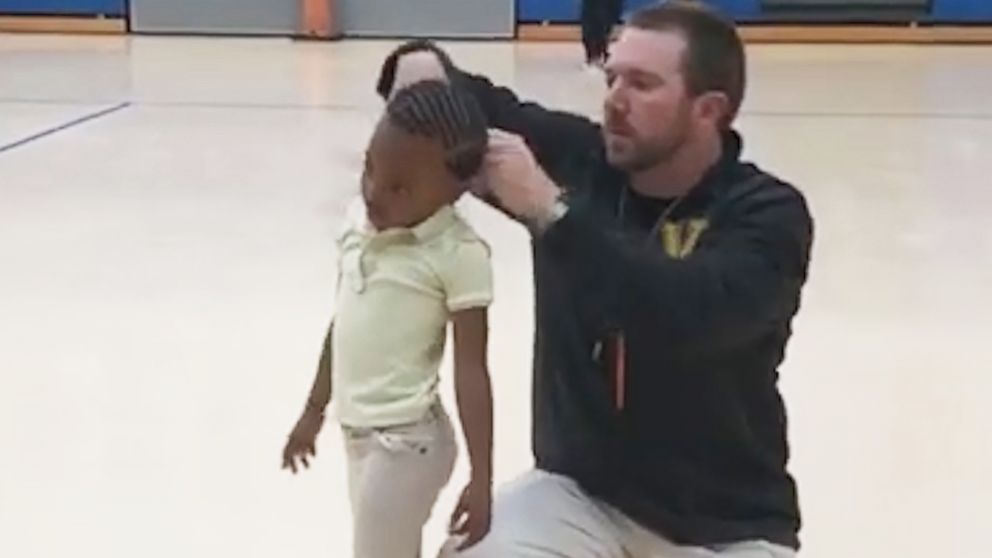 PHOTO: P.E. teacher Jonathan Oliver was filmed while putting Kristen Paulk's hair in a ponytail at WG Nunn Elementary School in Valdosta, Ga.