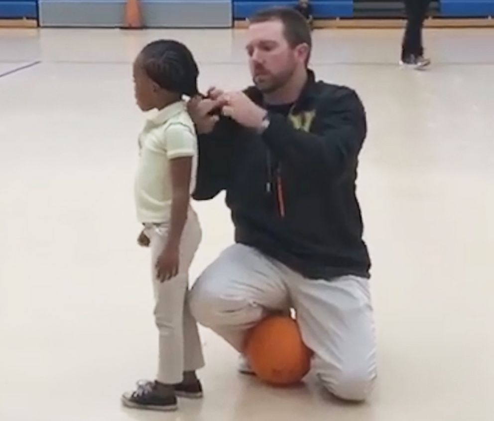 PHOTO: P.E. teacher Jonathan Oliver was filmed while putting Kristen Paulk's hair in a ponytail at WG Nunn Elementary School in Valdosta, Ga.