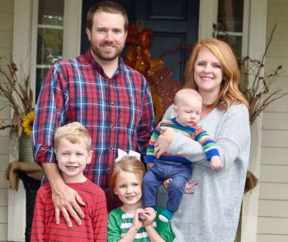 PHOTO: Jonathan Oliver, who is pictured with his family, recently appeared in a viral video while while putting his student's hair in a ponytail at WG Nunn Elementary School in Valdosta, Ga., where he works as a physical education teacher. 