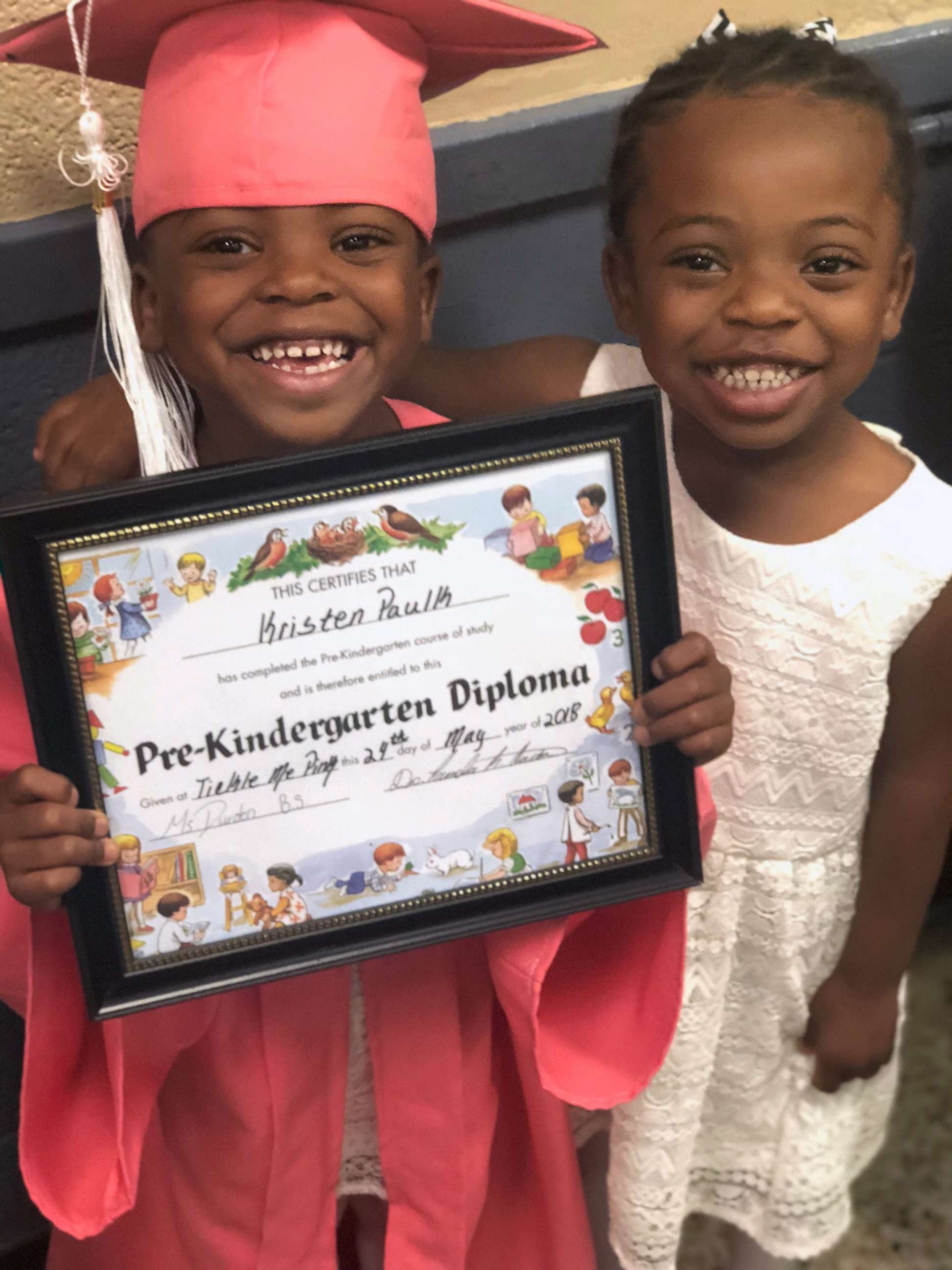 PHOTO: Kindergartner Kristen Paulk, left, is photographed with her sister, Claire Cleckly in an undated family photo. Kristen appeared in a viral video while her teacher Jonathan Oliver put her hair in a ponytail during gym class.