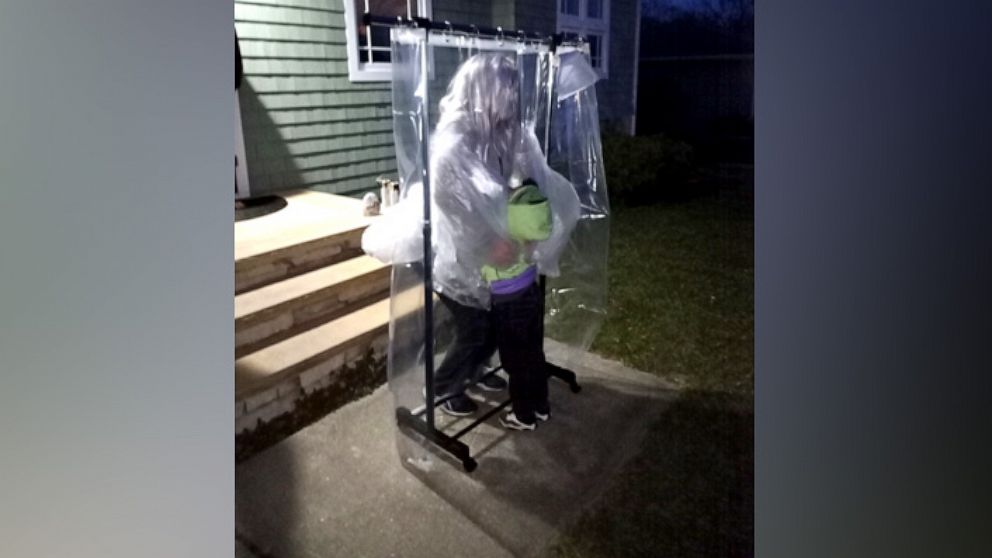 PHOTO: On March 13, Avery Green, 5, and his parents, Cathie and Al Green of Riverhead, New York, delivered the "hugging machine," to kindergarten teacher Keri Stromski outside of her Aquebogue, New York, home.