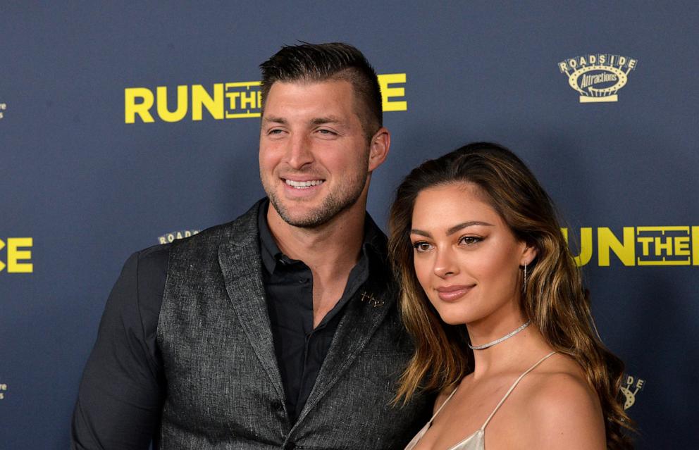 PHOTO: Tim Tebow and Demi-Leigh Nel-Peters attend the premiere of Roadside Attractions' "Run The Race" at the Egyptian Theatre, Feb. 11, 2019, in Hollywood.