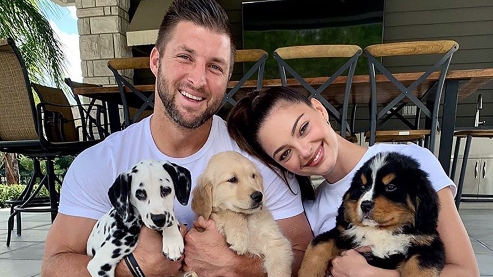 PHOTO: Tim Tebow and his wife Demi-Leigh Nel-Peters posted a photo to Instagram with their three new dogs that went viral.