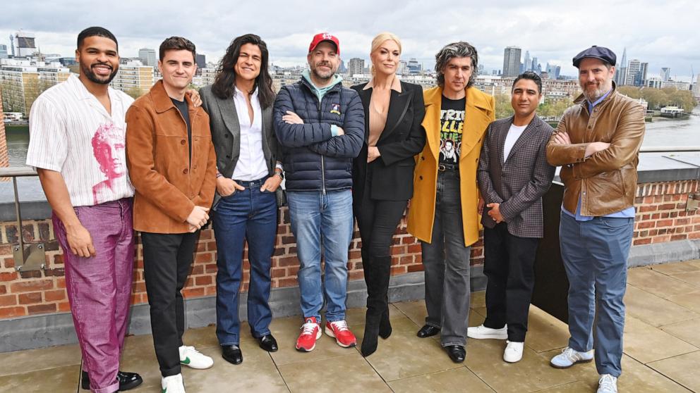 PHOTO: Kola Bokinni, Billy Harris, Cristo Fernandez, Jason Sudeikis, Hannah Waddingham, James Lance, Nick Mohammed and Brendan Hunt attend the "Ted Lasso" cast photocall at Battersea Power station on April 28, 2023 in London, England.