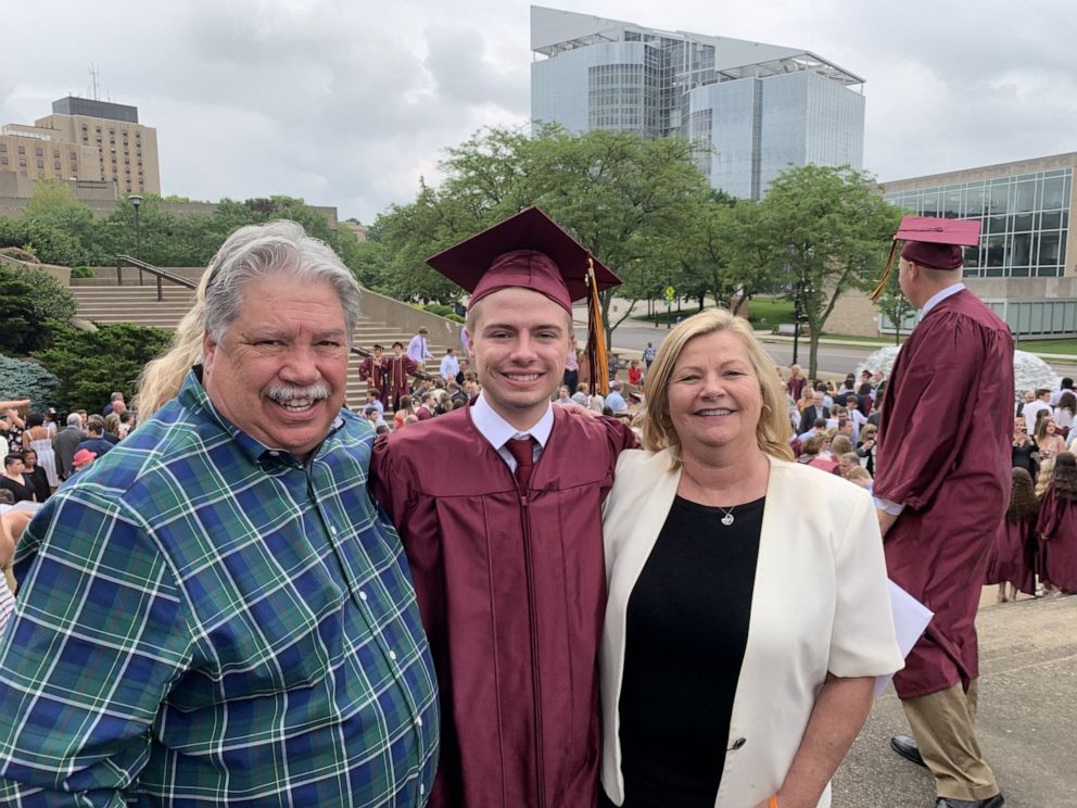 PHOTO: Matt Driscoll, 19, of Akron, Ohio, stands at his high school graduation with his parents, Ann and Jerry Driscoll.