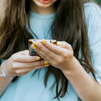 PHOTO: Stock photo of a teen girl on her cellphone.