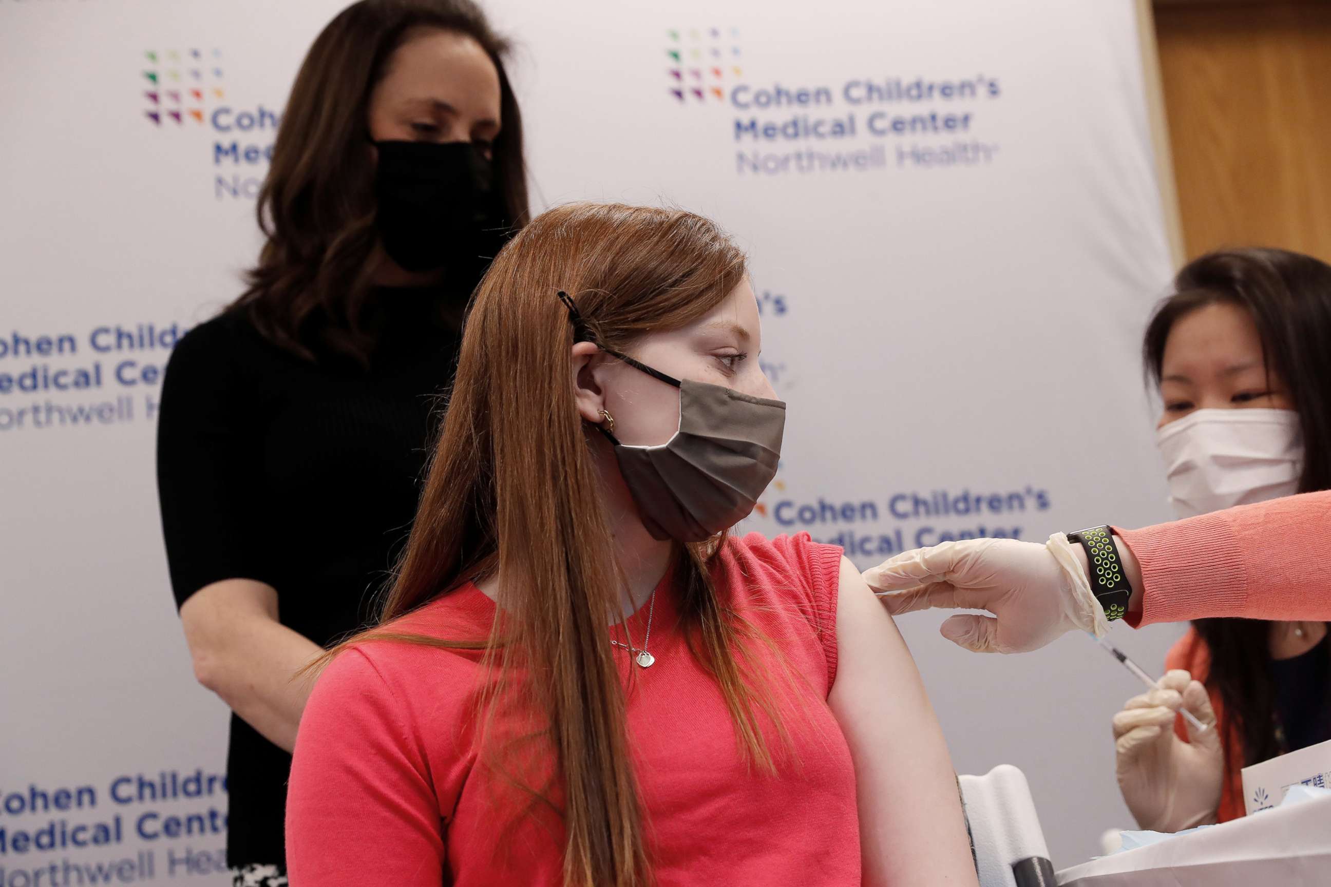 PHOTO: Hanna Riva Goldberg, 16, receives the first dose of the Pfizer COVID-19 vaccine from Dr. Sophia Chan at a Northwell Health vaccination pod in New Hyde Park, N.Y., April 6, 2021.