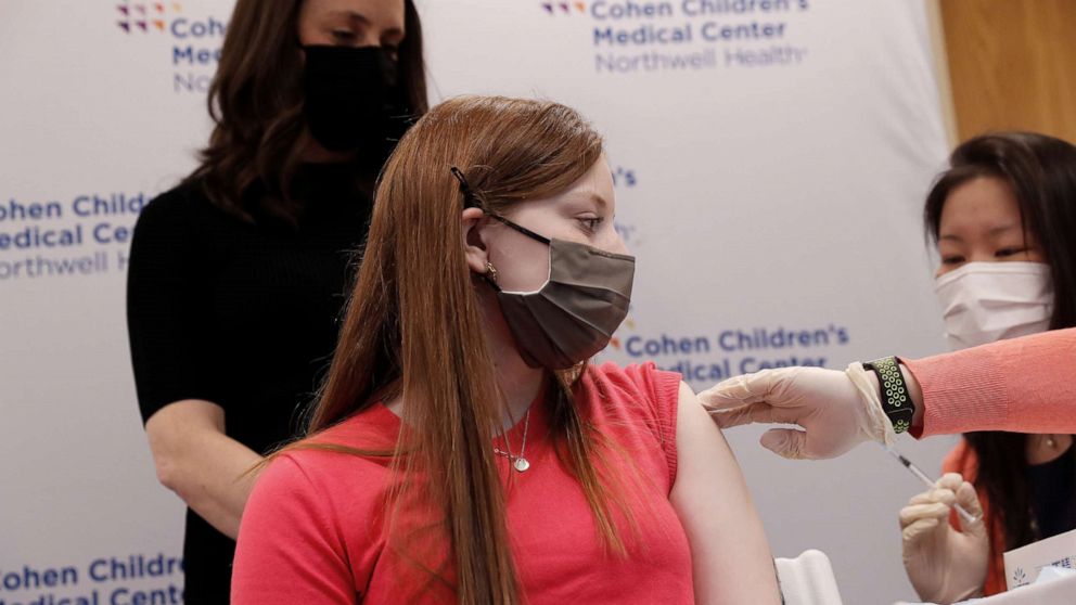 PHOTO: Hanna Riva Goldberg, 16, receives the first dose of the Pfizer COVID-19 vaccine from Dr. Sophia Chan at a Northwell Health vaccination pod in New Hyde Park, N.Y., April 6, 2021.