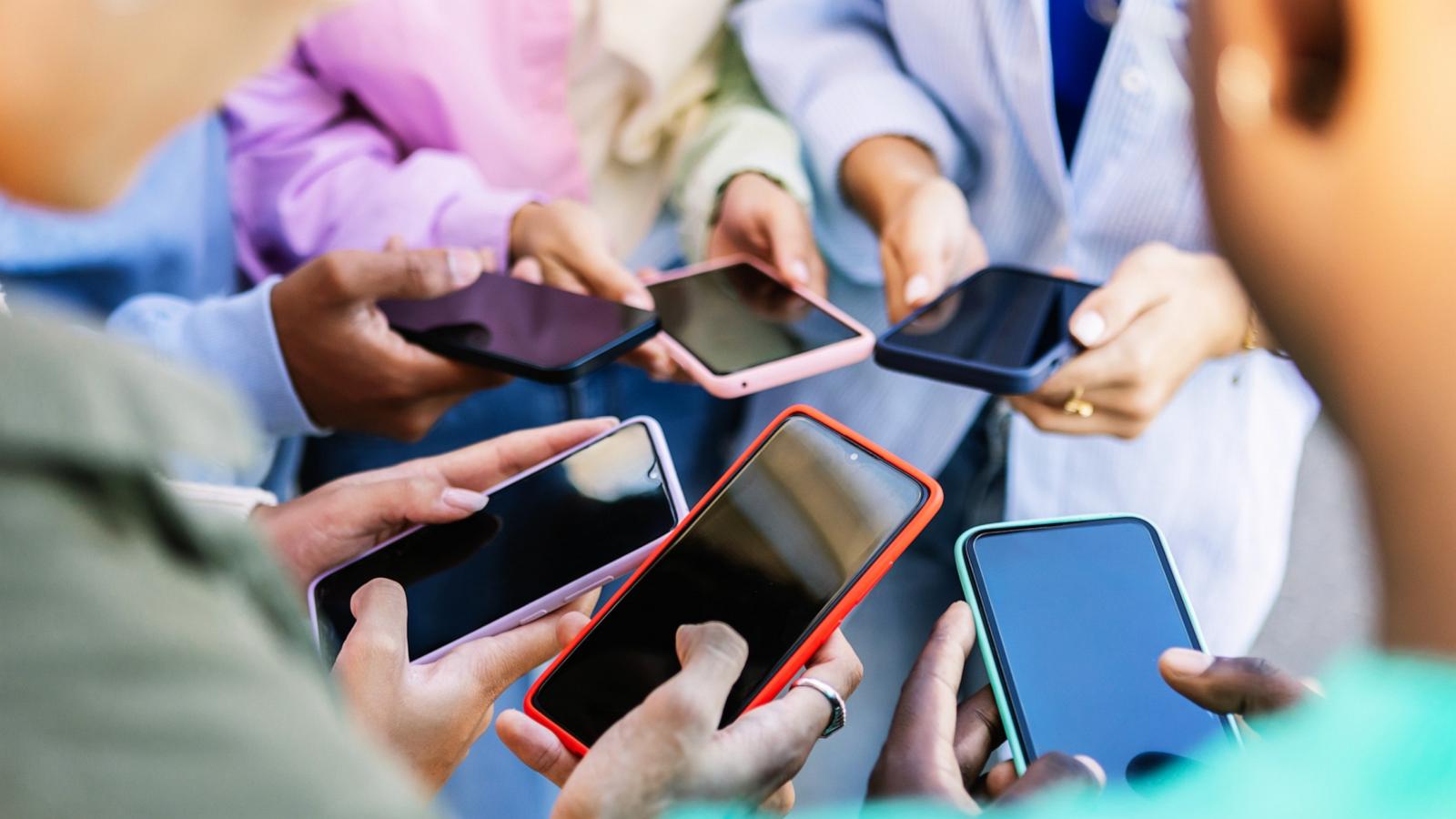 PHOTO: Teens use phone in this undated stock photo.