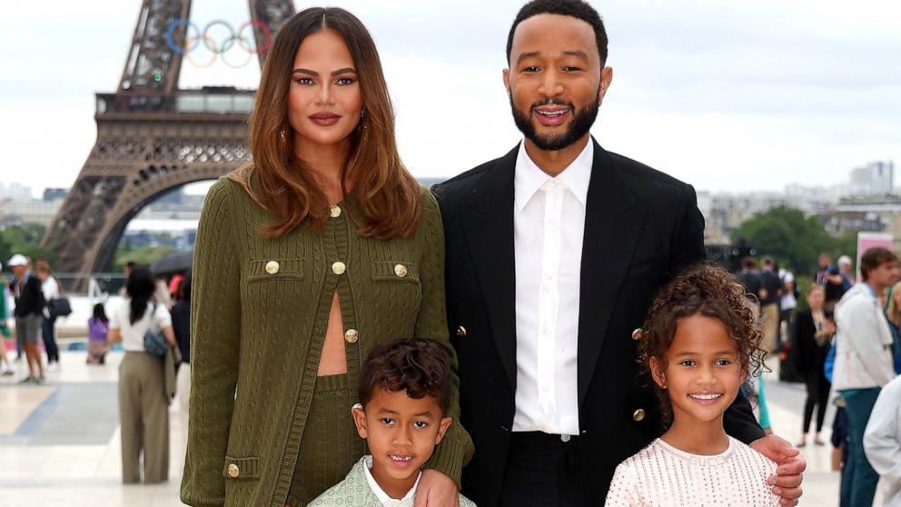 PHOTO: Chrissy Teigen and John Legend attend with son Miles and daughter Luna the red carpet ahead of the opening ceremony of the Olympic Games Paris 2024 on July 26, 2024 in Paris, France.