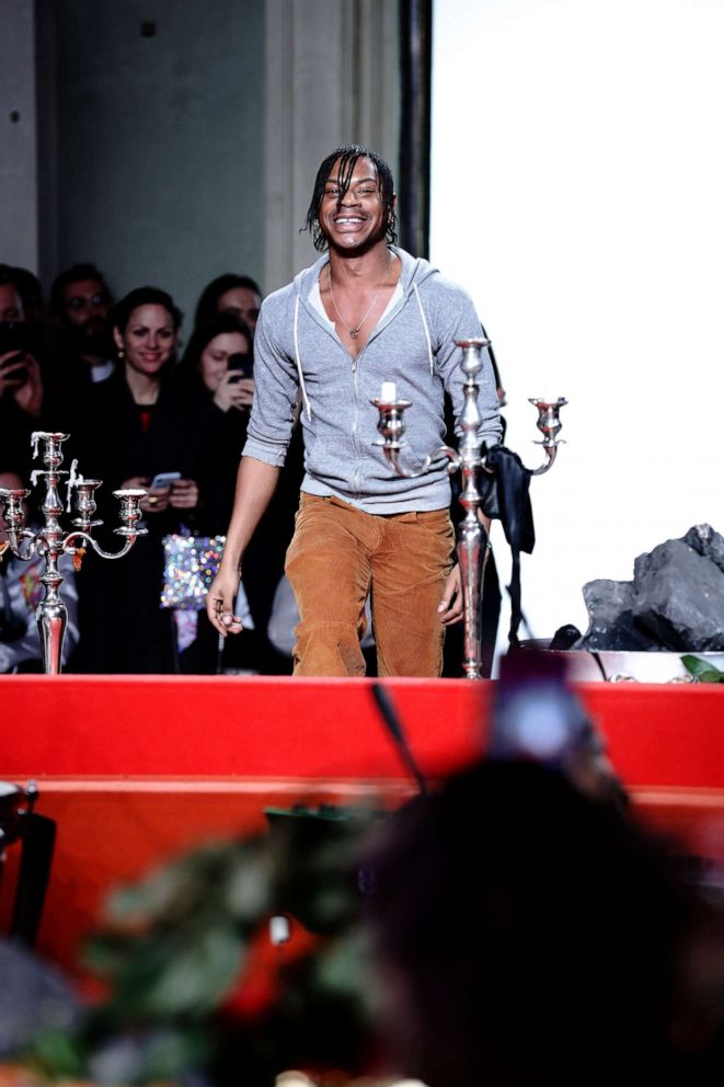 PHOTO: Fashion designer Telfar Clemens acknowledges the applause of the audience at Telfar fashion show during Pitti Immagine Uomo 97 at Fortezza Da Basso, Jan. 9, 2020. in Florence, Italy. 