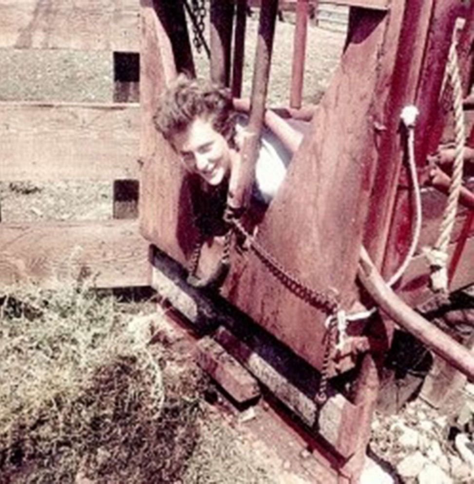 PHOTO: Dr. Temple Grandin in a 'squeeze machine' used to help animals stay calm at the ranch.