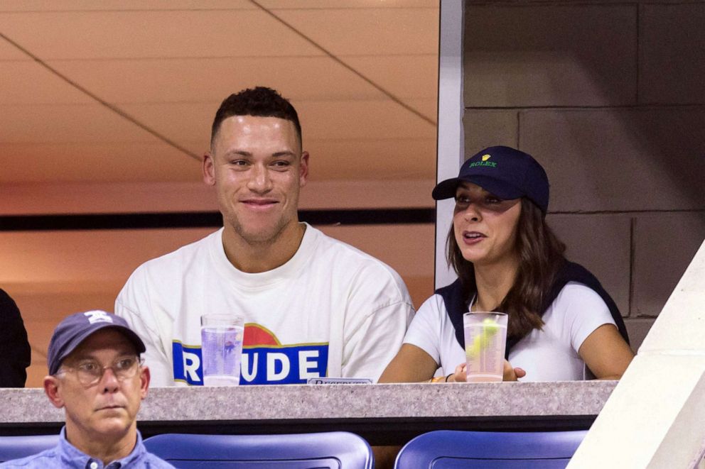 PHOTO: New York Yankee baseball player Aaron Judge watches Belarus's Aryna Sabalenka play against Russia's Daria Kasatkina during the US Open tennis tournament women's singles round of 16 match at the USTA Billie Jean King National Tennis Center