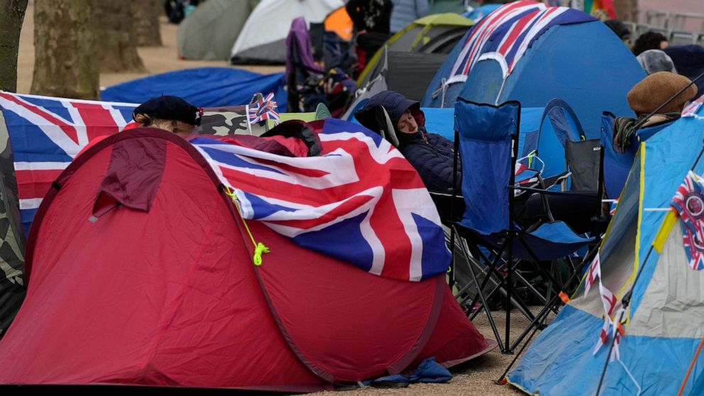 PHOTO: Royal fans who have spent the night camping out along The Mall, part of the Coronation route, begin to wake up, May 5, 2023.