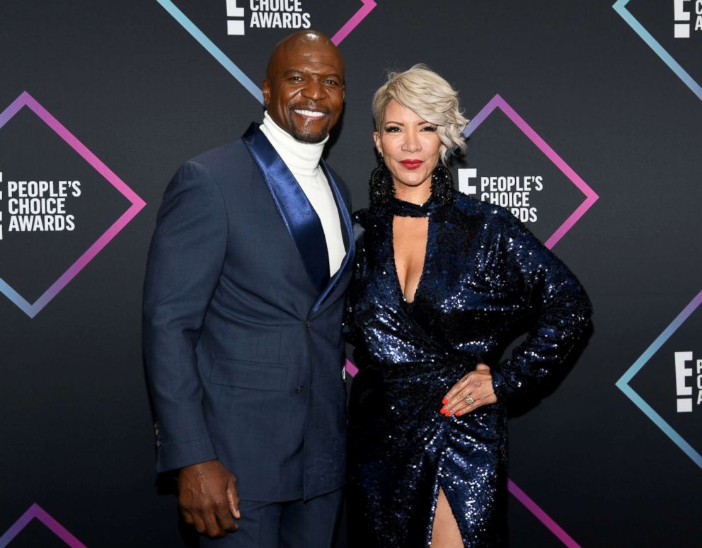 PHOTO: Terry Crews and Rebecca King-Crews arrive to the 2018 E! People's Choice Awards held at the Barker Hangar, Nov. 11, 2018.