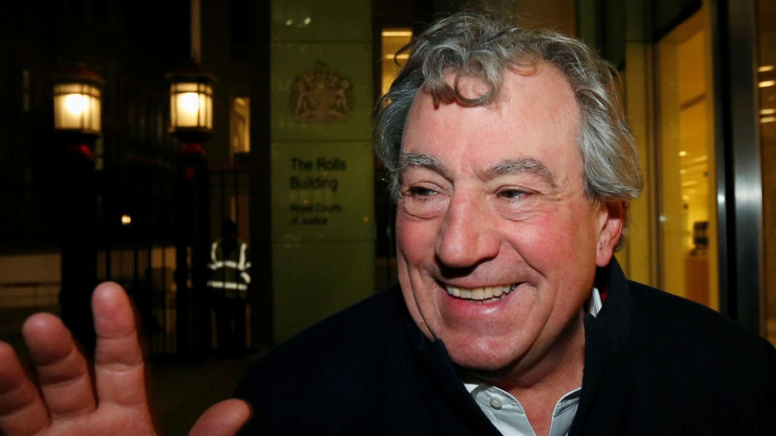 FILE PHOTO: British comedian Terry Jones smiles as he leaves The Rolls Building in central London November 30, 2012.