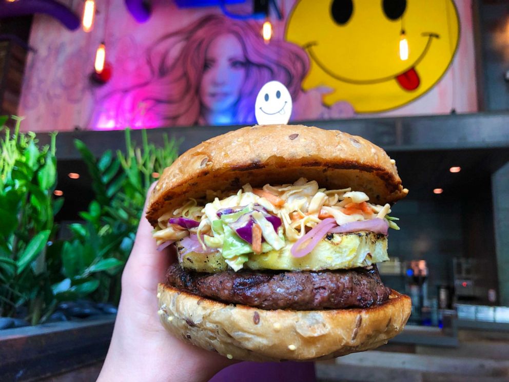 PHOTO: The "Thai Knee Dancer" burger at SkinnyFATS in Dallas, Texas includes a grass-fed quarter-pound patty, pickled red onion, grilled pineapple and cabbage peanut slaw inside a whole wheat bun. 