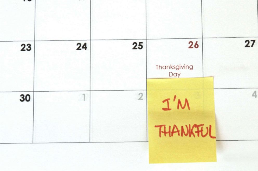 PHOTO: In this undated file photo, a sticky note reminder is on a calendar for Thanksgiving Day.