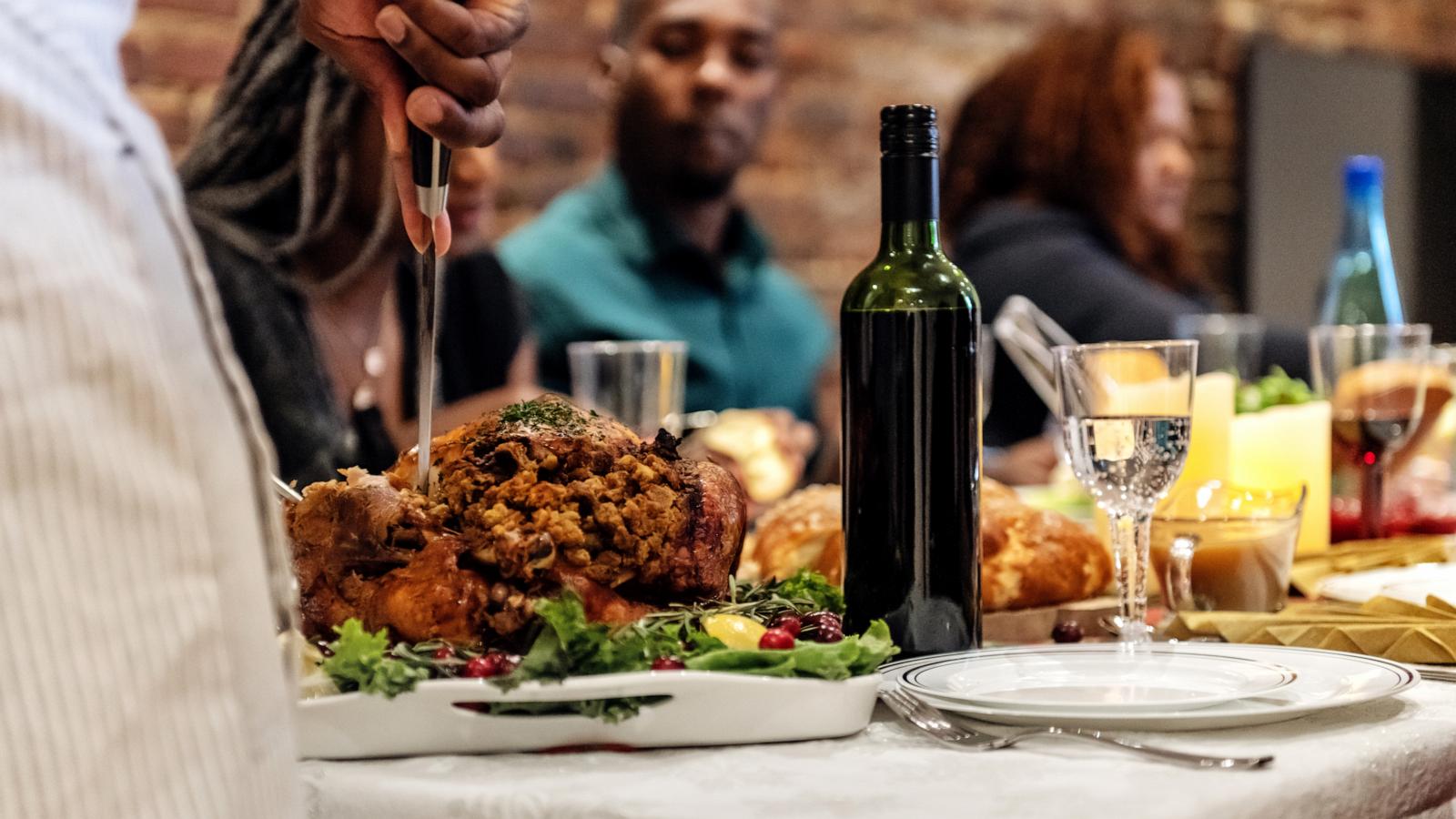 PHOTO: Stock photo of a family enjoy Thanksgiving dinner at a restaurant.