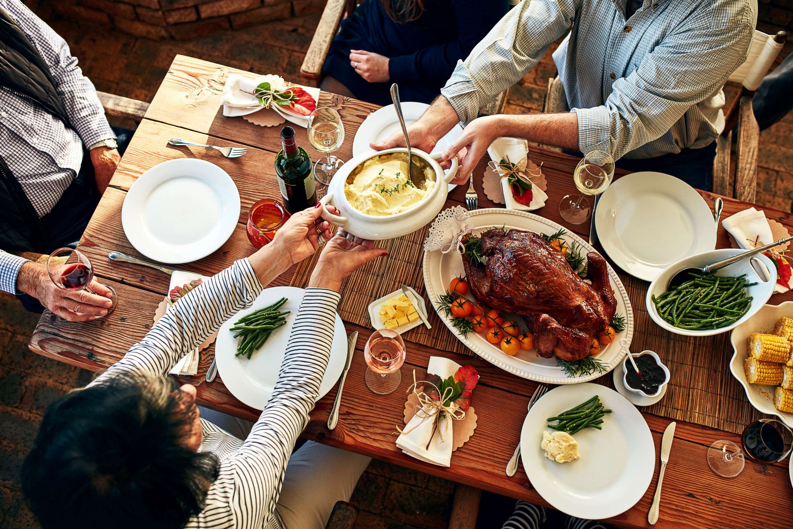 PHOTO: This stock photo depicts a family enjoying a Thanksgiving meal.
