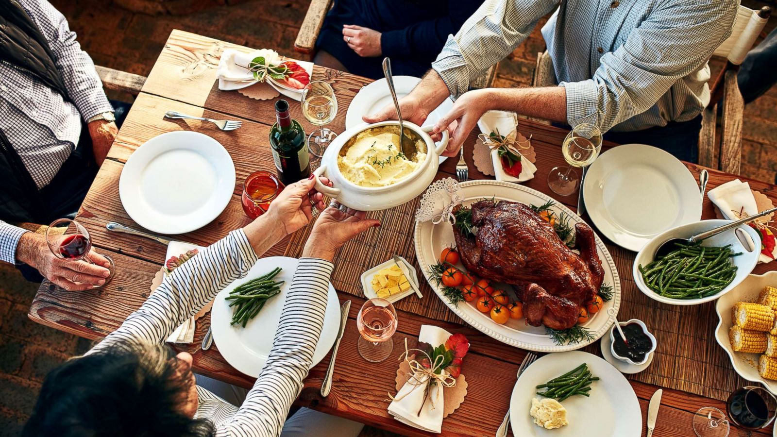 PHOTO: This stock photo depicts a family enjoying a Thanksgiving meal.